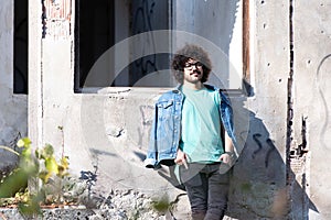 Trendy Handsome Man Posing at Ruins Ruined House