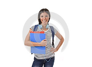 Trendy latin student girl holding notepad folder and book carrying backpack smiling happy