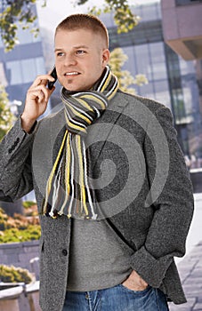 Trendy man using mobile phone