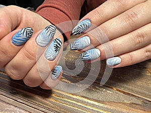 Trendy manicure design on a beautiful background