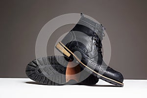 Trendy men`s shoes.fashion still life. men black boots