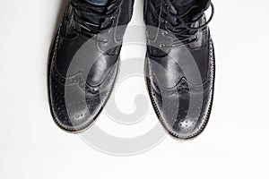 Trendy men`s shoes.fashion still life. men black boots