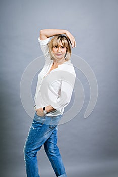 Trendy middle-aged woman with a charming smile