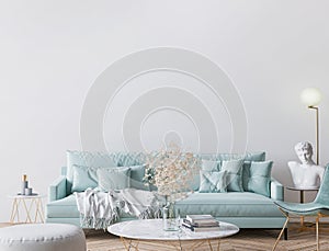 Trendy modern living room in light turquoise color and golden home accessories