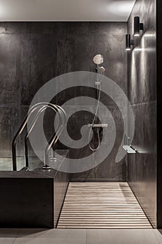 Trendy modern spa interior with tiled walls