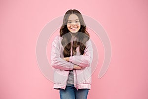 Trendy outfit. Little kid wear pink bomber jacket. Fashion girl. Modern fashion for kids. Clothes store. Fall trends