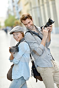 Trendy photographers with camera