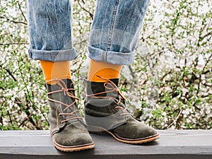 Trendy shoes and bright socks. Men`s and women`s style