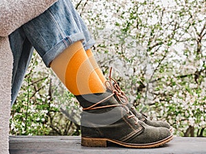 Trendy shoes and bright socks. Men`s and women`s style