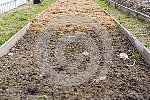 A trendy technology in horticulture such as mulching of beds to preserve the properties and fertilize the soil and control weeds.