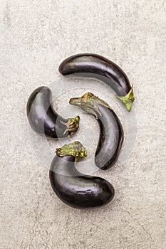 Trendy ugly organic vegetables. Fresh baby eggplants