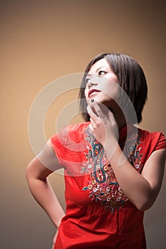 Trendy woman in deep thought