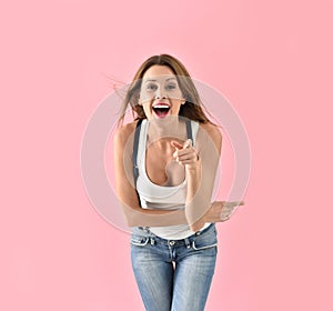 Trendy woman pointing fingers isolated