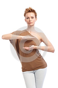 Trendy woman pretending to hold something