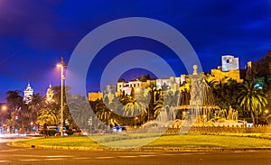 Tres Gracias Fountain and Alcazaba Castle in Malaga - Adalusia, Spain photo