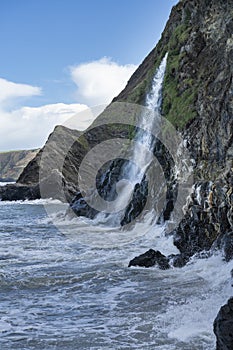 Tresaith Waterfall, Tresaith beach in Ceredigion, Wales photo