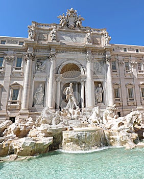 Trevi fountain with the great Roman god Neptune by day in Rome photo