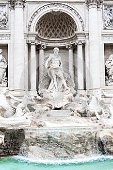 Trevi Fountain, Italian: Fontana di Trevi. Detailed view o central part with statue of Oceanus. Rome, Italy photo