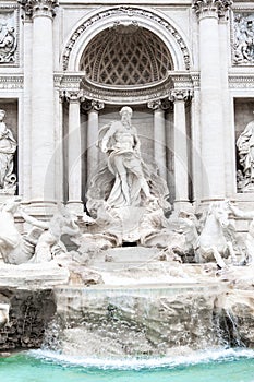 Trevi Fountain, Italian: Fontana di Trevi. Detailed view o central part with statue of Oceanus. Rome, Italy