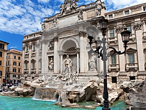 Trevi Fountain in Rome against the cloudy sky - Italy. (Fontana di Trevi)