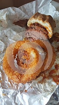 Tri-tip sandwich with onion rings