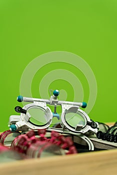Trial frame glasses to examine eye visual system of patient with short or long power vision. Close-up trial frame