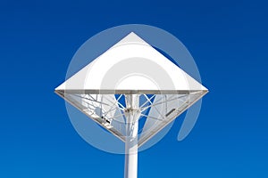 Triangle billboard or advertising poster with blue sky background