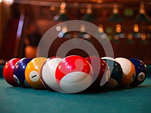 Triangle of billiard balls on the table