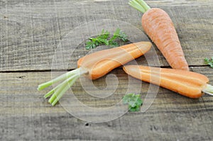 Triangle made of carrot and cut on wooden rustic