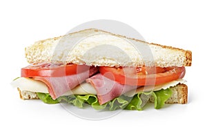 Triangle sandwich with ham, cheese and vegetables