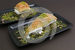 Triangle Shaped and Big Baklava with ice cream and pistachio