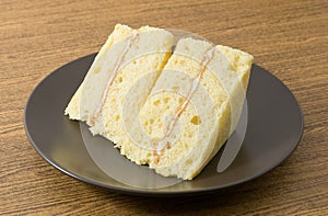 Triangle Vanilla Chiffon Cake on A White Dish