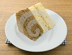 Triangle Vanilla and Coffee Chiffon Cake on A Dish
