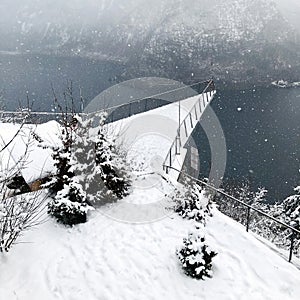 Triangle viewpoint Hallstatt Winter snow mountain landscape hike epic mountains outdoor adventure and lake through the pine