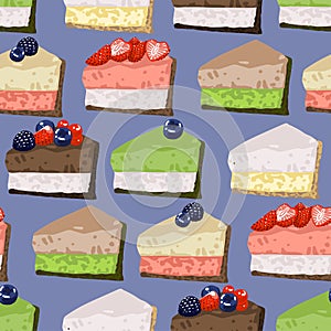 Triangular cake pieses of different tasted covered with berries.