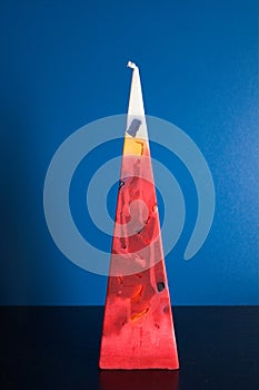 Triangular colored candle