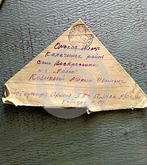 Triangular letter from the front