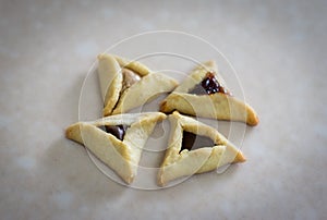 Triangular pastry made of crispy dough stuffed. Traditional Jewish food for Purim.