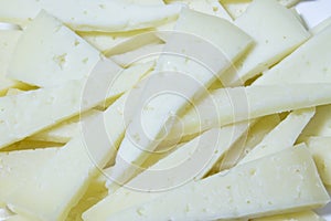 Triangular pieces of sliced of cheese