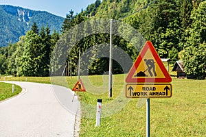 Triangular Road Work Ahead Sign or Work in Progress Sign