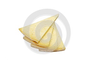 Triangular slice of old cheddar cheese. Piece of yellow cheese with sliced pieces on white background