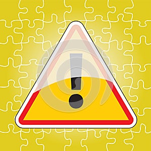 Triangular warning sign on puzzle