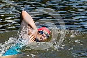 Triathlete in front crawl swimming