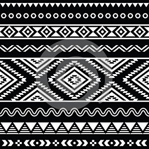 Tribal seamless aztec white pattern on black background photo