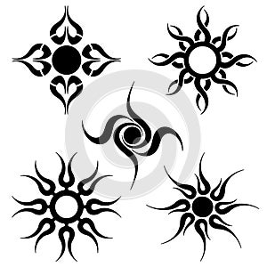 Tribal sun tattoo's