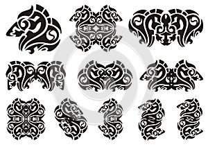 Tribal wavy dragon head symbols