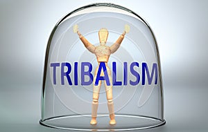 Tribalism can separate a person from the world and lock in an invisible isolation that limits and restrains - pictured as a human photo