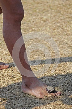 Tribes playing stone kancha game