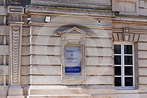 Tribunal de grande instance french text sign on ancient wall entrance building means High Court in french in libourne city france