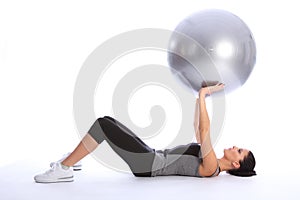 Tricep brachii muscle exercise with fitness ball photo